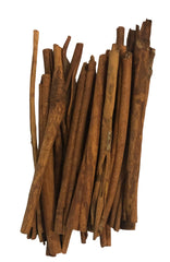 Bunch of cinnamon sticks on a white background