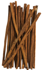 Bunch of cinnamon sticks on a white background