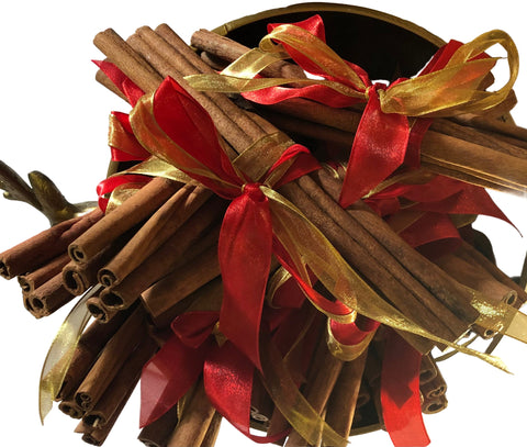 A Dozen Sweet Cinnamon Bundles, A Champagne Bucket & A Bottle of Oil 30ml